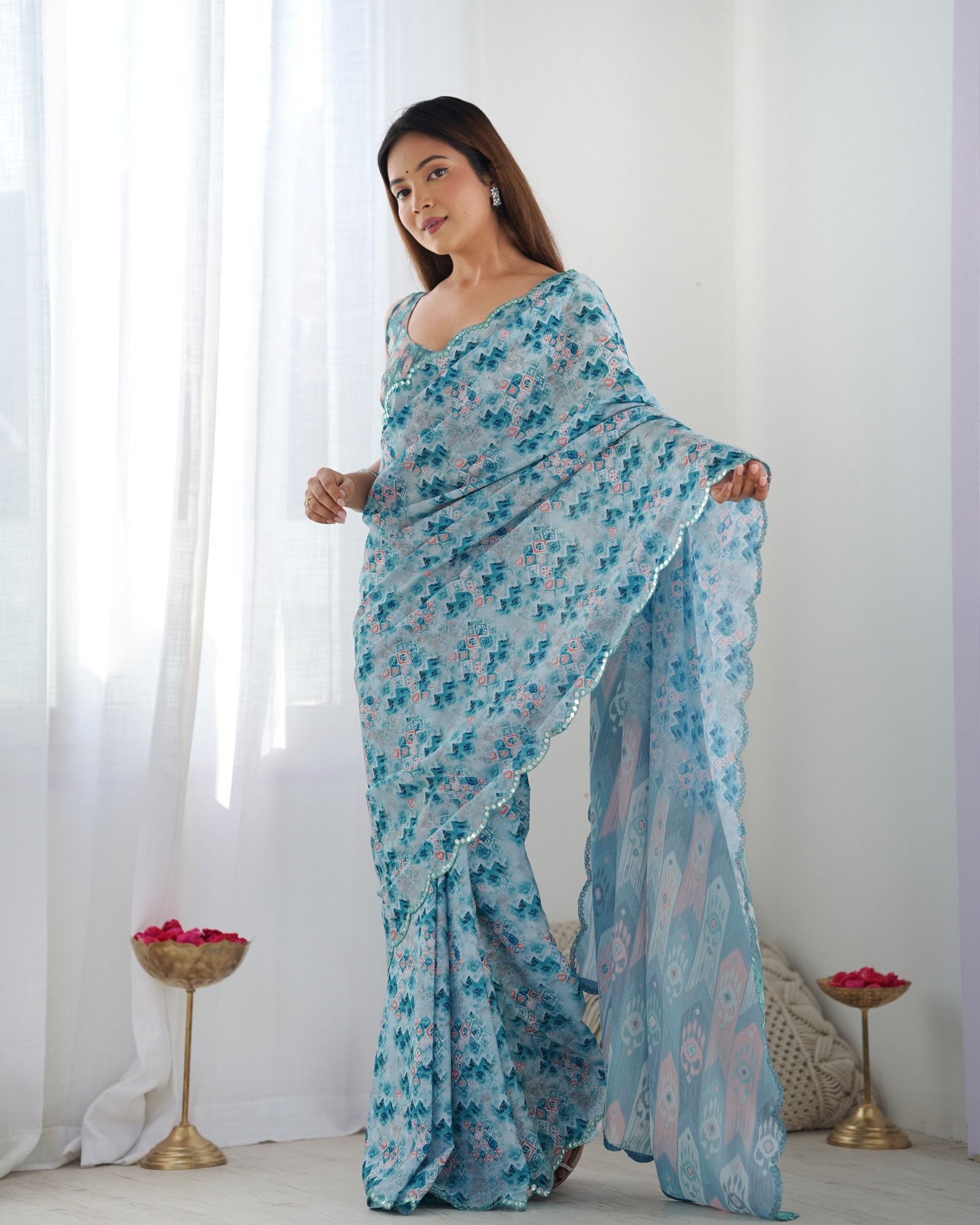 Sky Blue Printed Chinnon Saree with Kutchi Mirror Work Border