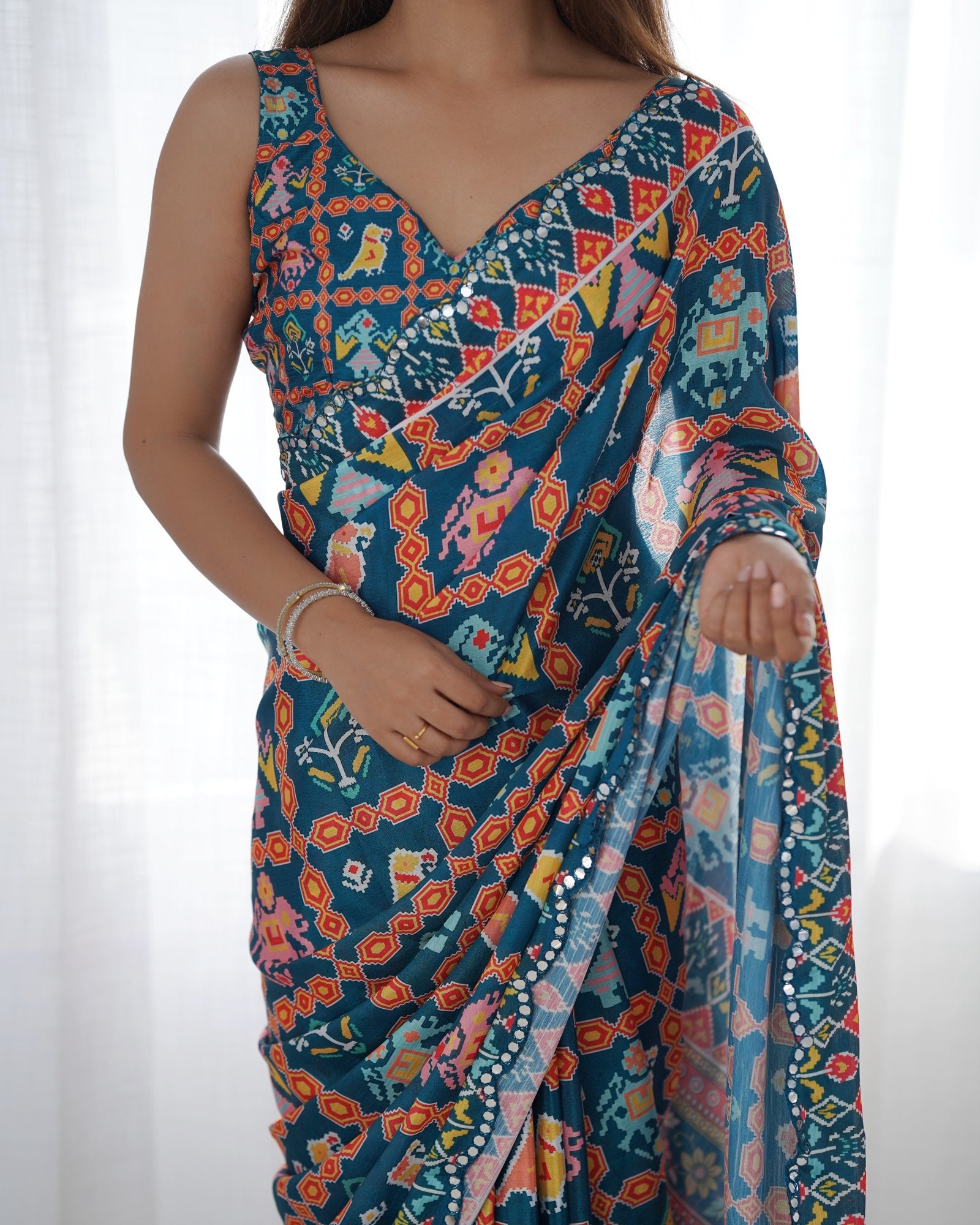 Teal Blue Multicolor Chinnon Saree with Kutchi Work Mirror Border