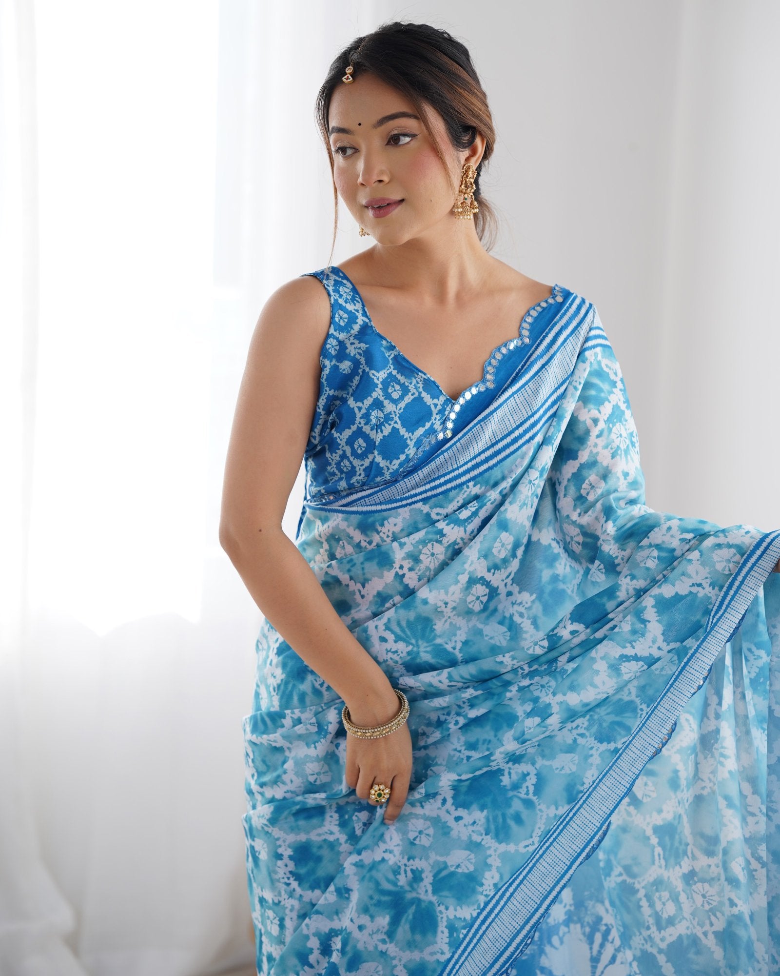 DVS-21 Blue & White Chinnon Saree with Kutchi Mirror Work