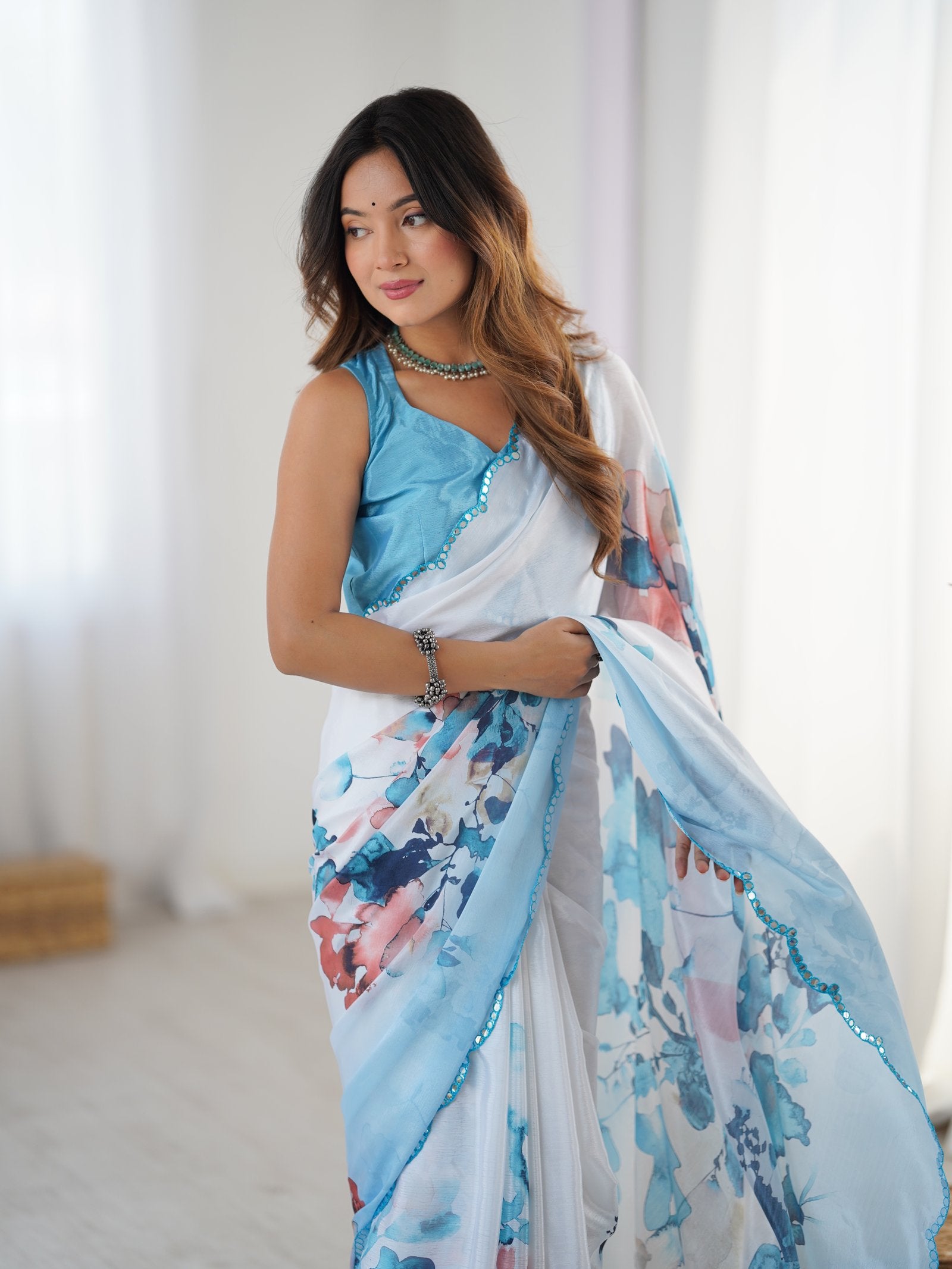 White & Blue Floral Print Heavy Chinnon Saree with Mirror Lace