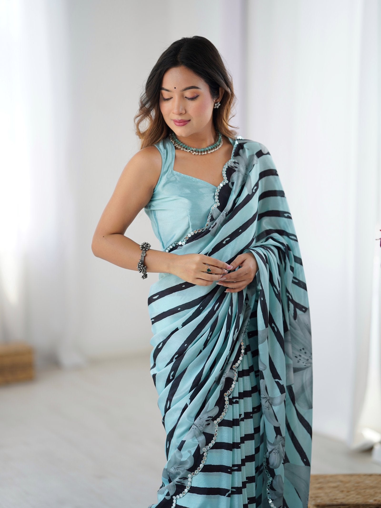 Aqua Blue & Black Printed Chinnon Saree with Kutchi Mirror Border