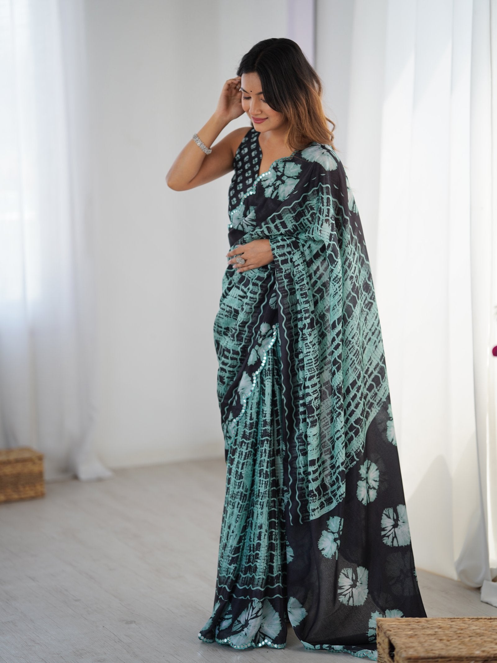 DVS-78 Black & Teal Chinnon Saree with Kutchi Mirror Lace Border
