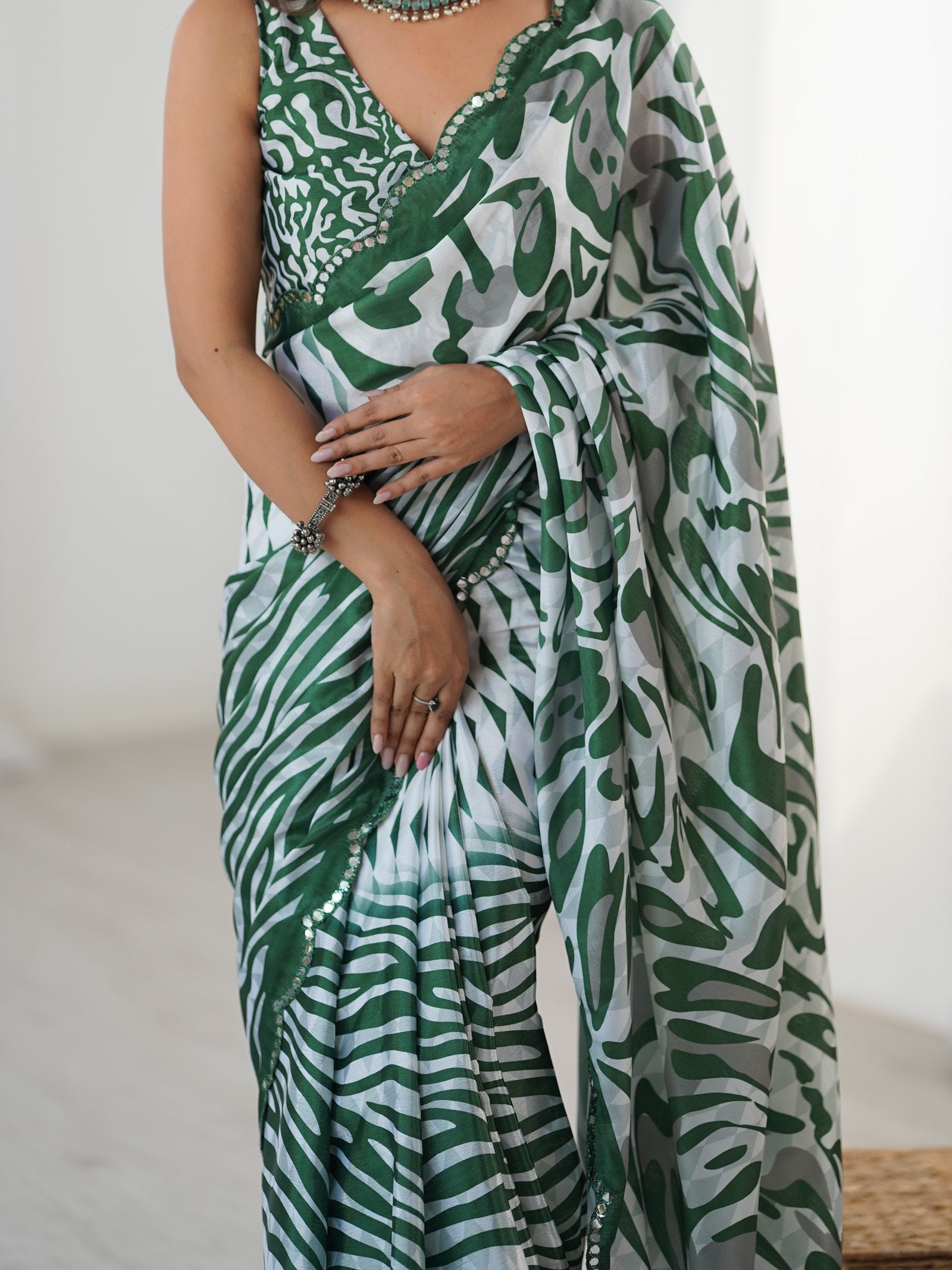 DVS-78 Black & Teal Chinnon Saree with Kutchi Mirror Lace Border