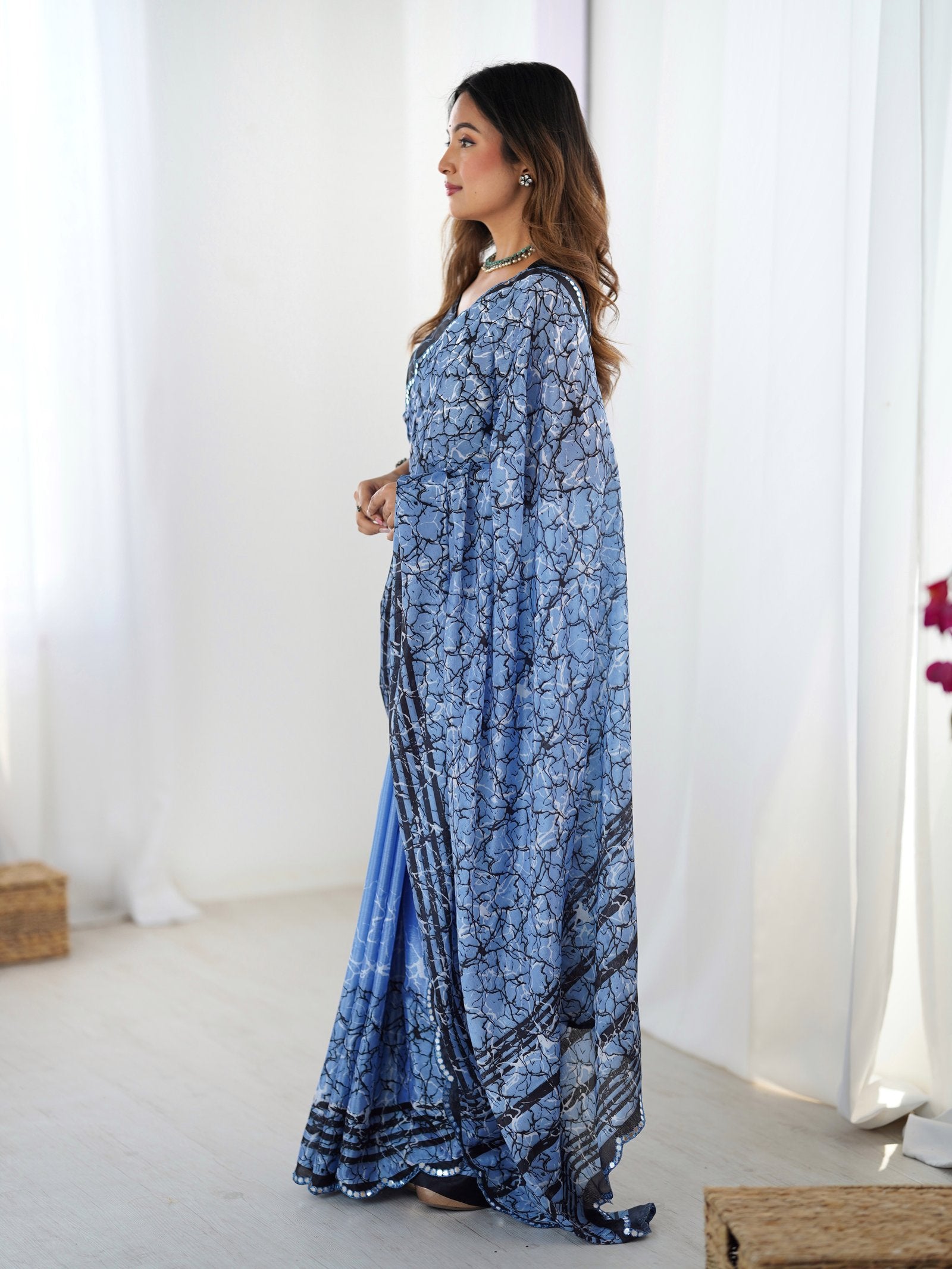 Sky Blue Chinnon Saree with Kutchi Mirror Work Border
