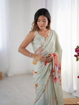 Elegant Pastel Green Chinnon Saree with Kutchi Mirror Border